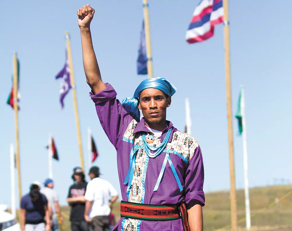 A protestor fights the power at the Standing Rock Sioux Tribe reservation last September. - JEFF FERGUSON