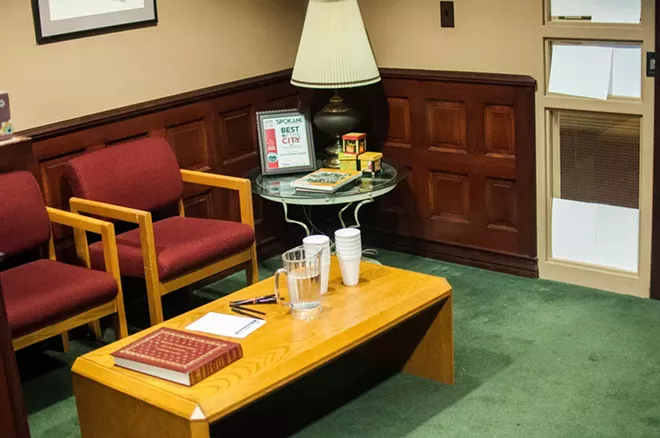 While the fire-code restricts this public waiting area to two people at a time — the entire office can hold 30. - DANIEL WALTERS PHOTO