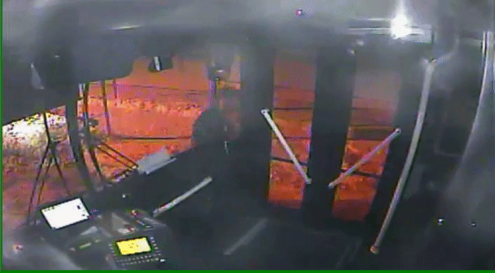 An angry motorist pounds on the glass of the door of an STA bus in December, shattering the glass. - STA CAMERA FOOTAGE