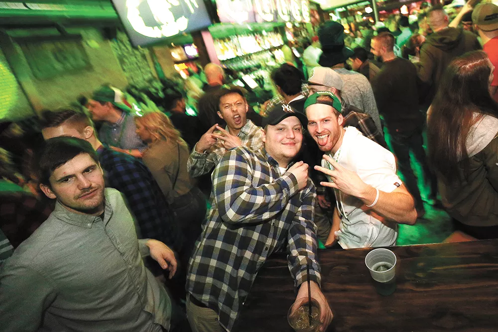 Some revelers who grew up in Spokane say they don’t recall a nightlife scene like the one on Main and Division. - YOUNG KWAK