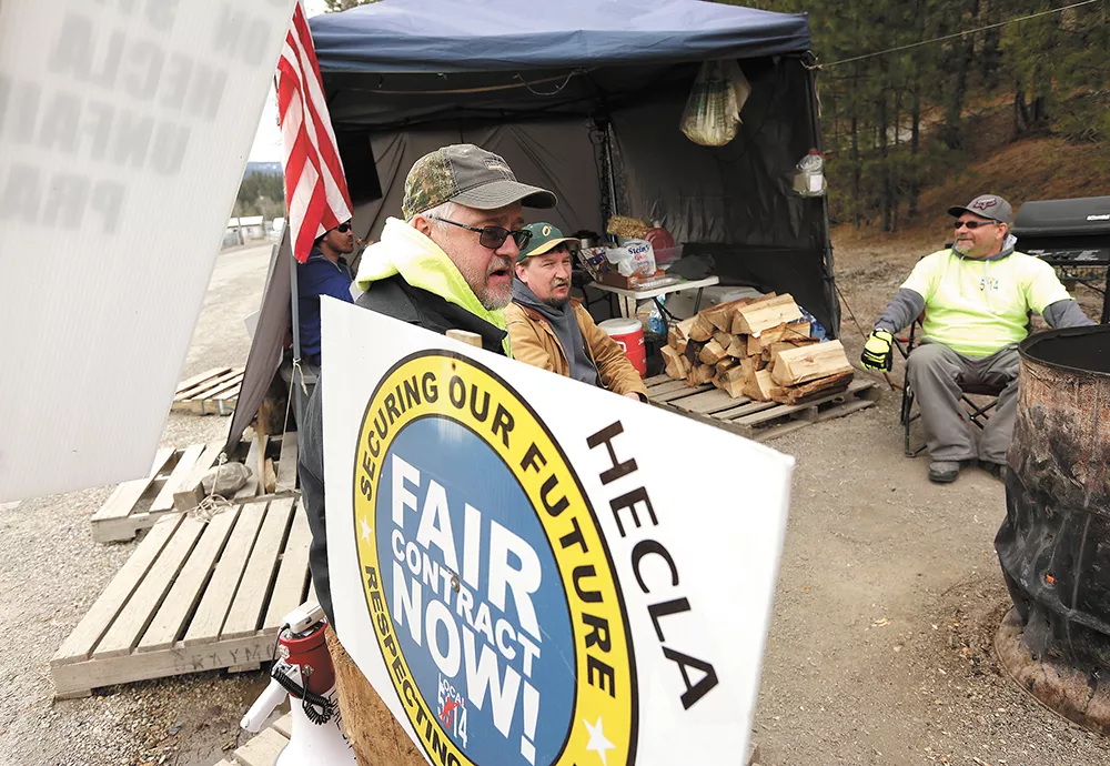 Striking workers Dan Daiker, Ron Sullivan and Doug Beard sit at a picket line outside Lucky Friday mine earlier this month. - YOUNG KWAK