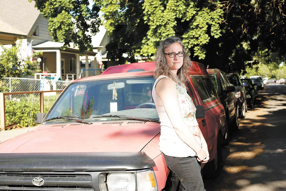 Arielle Anderson is frustrated over the fact it's illegal to leave her car parked on a city street for more than 24 hours. - YOUNG KWAK