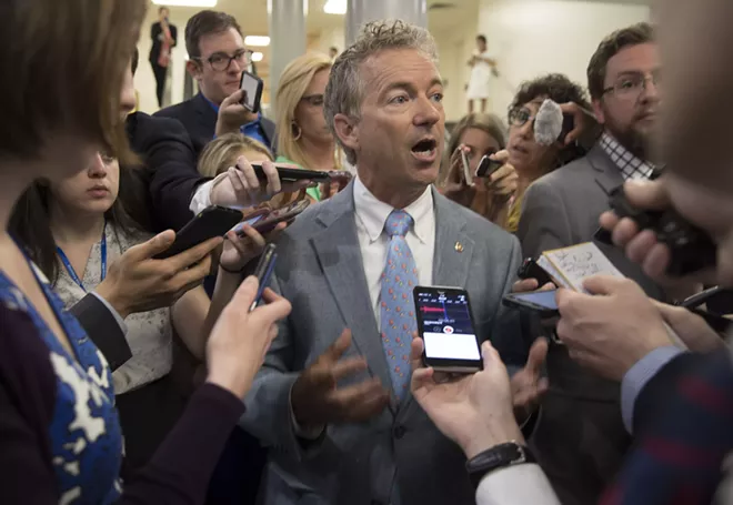 Sen. Rand Paul (R-Ky.), who opposes current Senate health care bill, comments on its Congressional Budget Office score, in Washington, June 26, 2017. The bill would increase the number of people without health insurance by 22 million by 2026, only slightly lower than the 23 million more uninsured that the House version would create, according to the CBO. - STEPHEN CROWLEY/THE NEW YORK TIMES