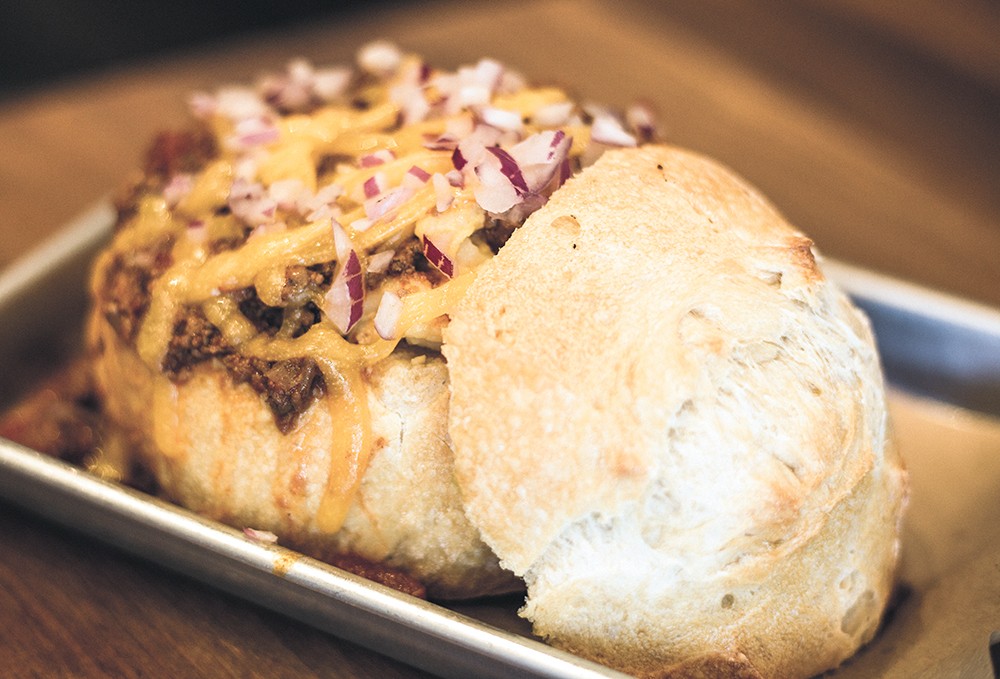 This bread bowl stuffed with chili mac is another house specialty. - DAN COUILLARD