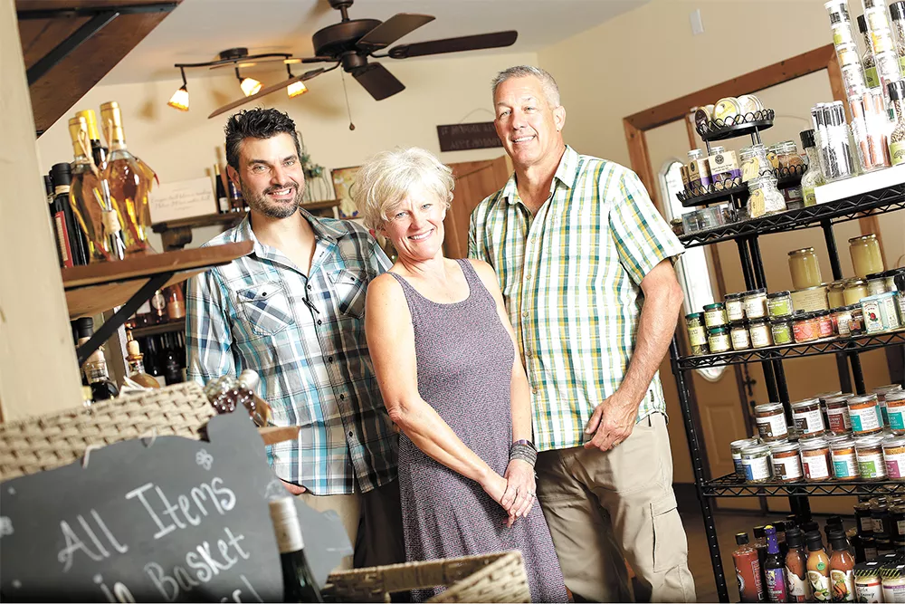 Petunias' new owners, Matt Dolan (left) and Tammy and Russell Fleming, plan to carry on its local legacy. - YOUNG KWAK