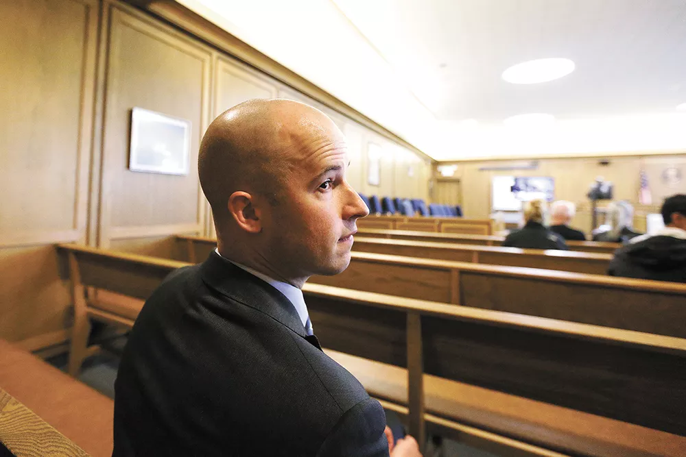Aaron Stromberger sits in court while a judge decides who stays and who is released from jail. Judges agree with his office's recommendations to release people charged with crimes about 83 percent of the time. - YOUNG KWAK