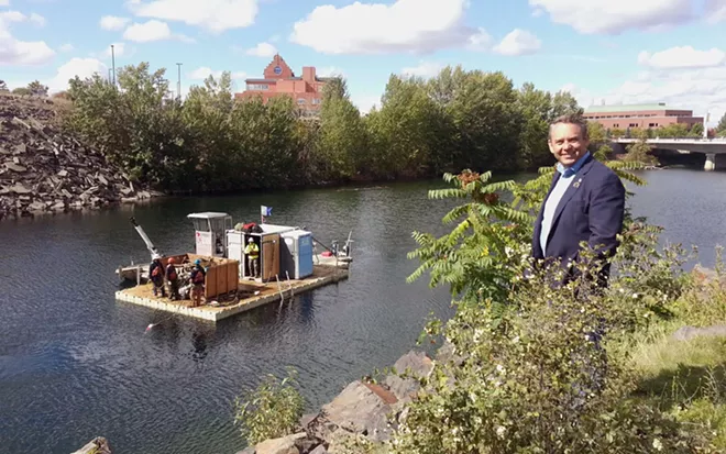 Mayor David Condon stands in front of the Spokane River during a 2015 river cleanup day. - CITY OF SPOKANE PHOTO