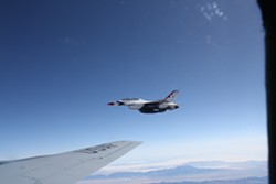 A Thunderbird flies off the wing of a KC-135 from Fairchild Air Force Base on Thursday.