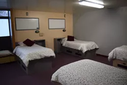 Four of the 13 beds at Daybreak's just-opened evaluation and treatment center. - WILSON CRISCIONE PHOTO