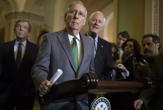 Senate Majority Leader Mitch McConnell (R-Ky.) during a weekly news conference on Capitol Hill on Tuesday, Dec. 12, 2017. House and Senate Republicans have reached an agreement, in principle, on a consensus tax bill on Wednesday, keeping the party on track for final votes next week with the aim of delivering a bill to President Trump’s desk by Christmas, according to people briefed on the deal. - TOM BRENNER/THE NEW YORK TIMES