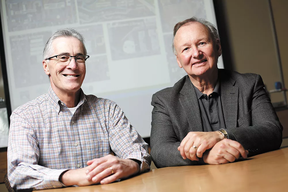 Rick Romero (left), from the city of Spokane, and Mark Anderson, with Spokane Public Schools, envision joint projects to meet both their needs. - YOUNG KWAK