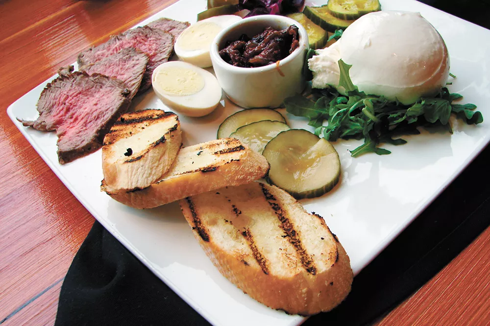 The beef and burrata plate, served with baguette, caramelized onion and tomato jam and pickled veggies. - CARRIE SCOZZARO