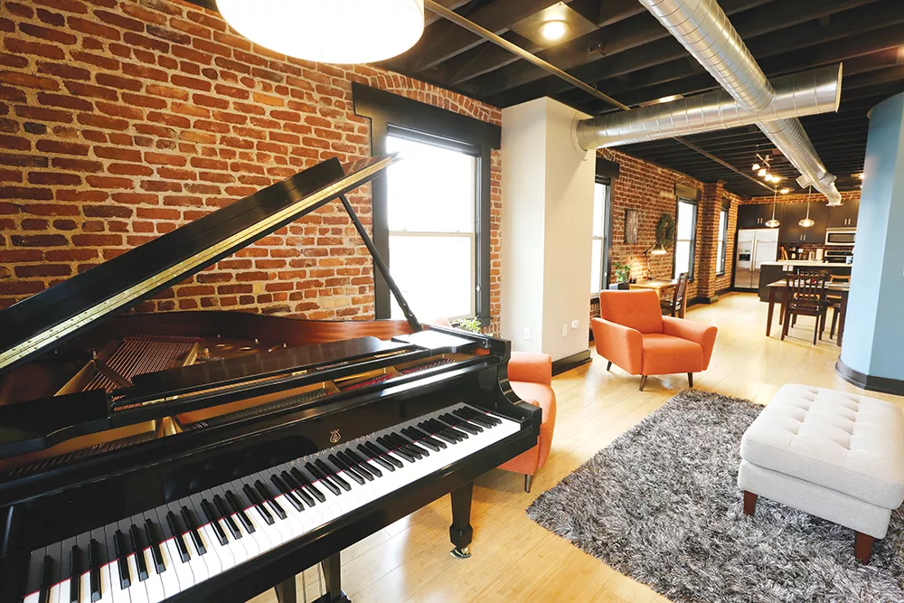 Gonzaga’s choir director by day, Tim Westerhaus has even installed a grand piano in his new condo. - YOUNG KWAK