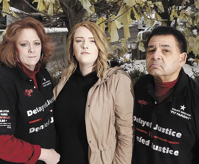 Ron and Teresa Simon, pictured here with Teresa's daughter Megan, have been fighting to get their son back since 2015. - YOUNG KWAK