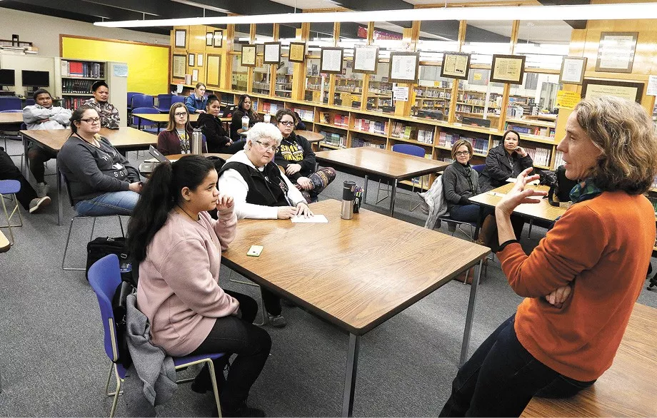 UW anthropology professor Holly Barker, right, talks about the legacy of U.S. nuclear testing at Shaw Middle School. - YOUNG KWAK