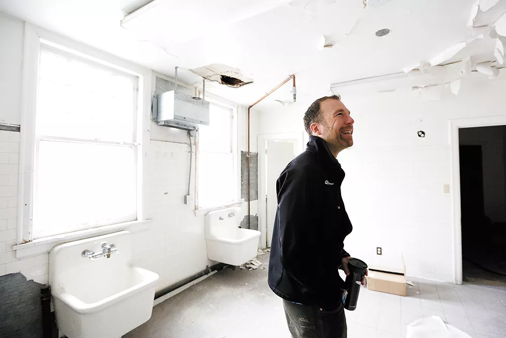 Denton Meier and his partners are remodeling a former funeral home — including the embalming room pictured above — to house their tech companies and hope to mine for Bitcoin in the basement. - YOUNG KWAK