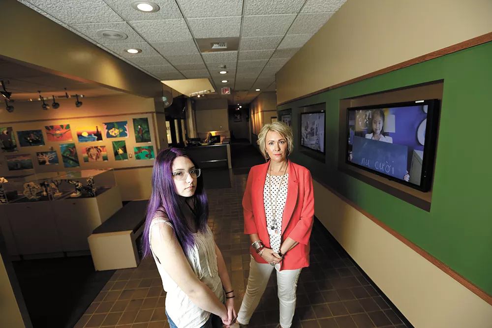 Rogers High School junior Jackee Smith (left) and Spokane Public Schools' student services coordinator Chris Moore want to raise awareness about youth suicide. - YOUNG KWAK