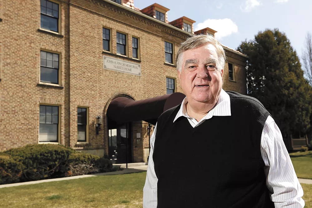 Developer Ron Wells turned apartment units in Finch Hall into condominium units — but it's a lot more difficult to build condos from scratch. - YOUNG KWAK