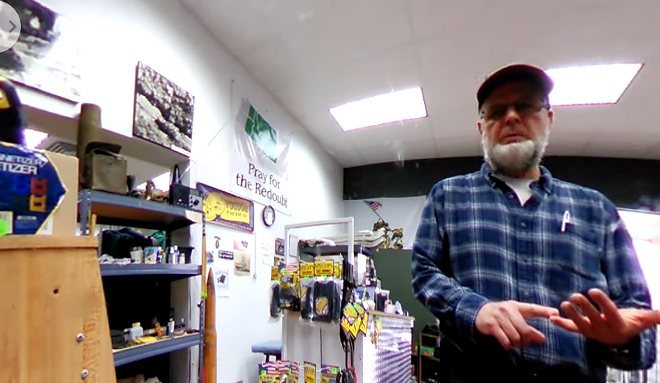 Pastor Warren Mark Campbell runs a military surplus store and a Christian church in Coeur d'Alene. Both glorify the Confederacy. - CBC NEWS SCREENCAP