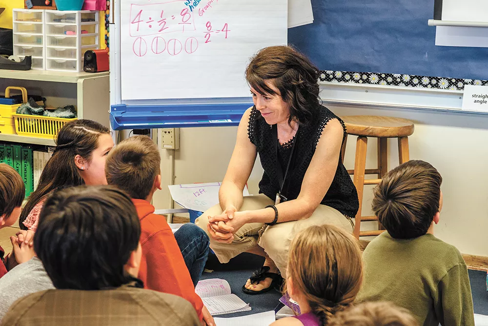 Fourth- and fifth-grade teacher Beth O'Regan tries to get her students to think like mathematicians. - ERICK DOXEY PHOTO