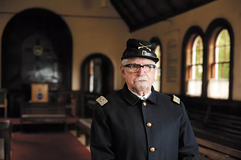 North Idaho Museum visitors love a man in uniform: Robert Singletary at Fort Sherman Chapel. - YOUNG KWAK