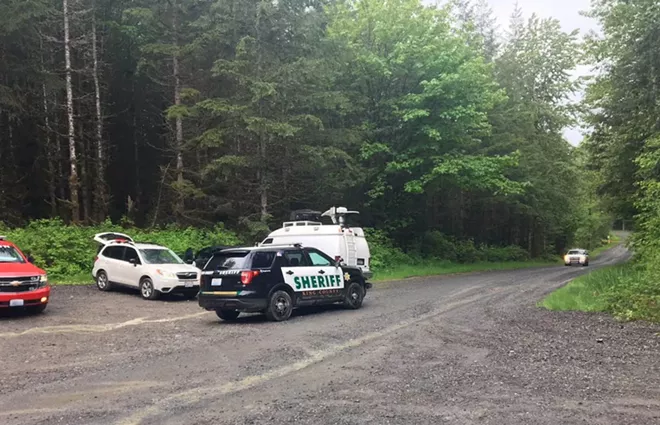 The authorities responding near Lake Hancock, northeast of Snoqualmie, Wash., where a cougar attacked two bicyclists on Saturday, killing one of them. - SGT. RYAN ABBOTT/KING COUNTY SHERIFF’S OFFICE