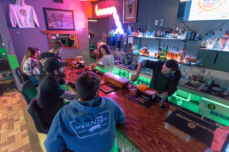 GeeksNGlory patrons at the bar. - ERICK DOXEY
