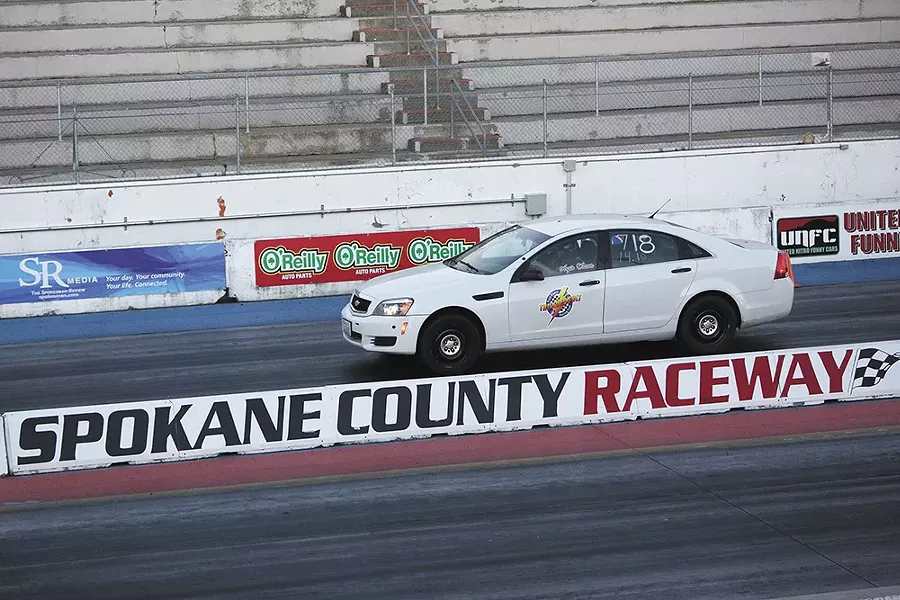 Angie Weaver steers her 2013 Chevrolet Caprice Police Interceptor down the track. - YOUNG KWAK