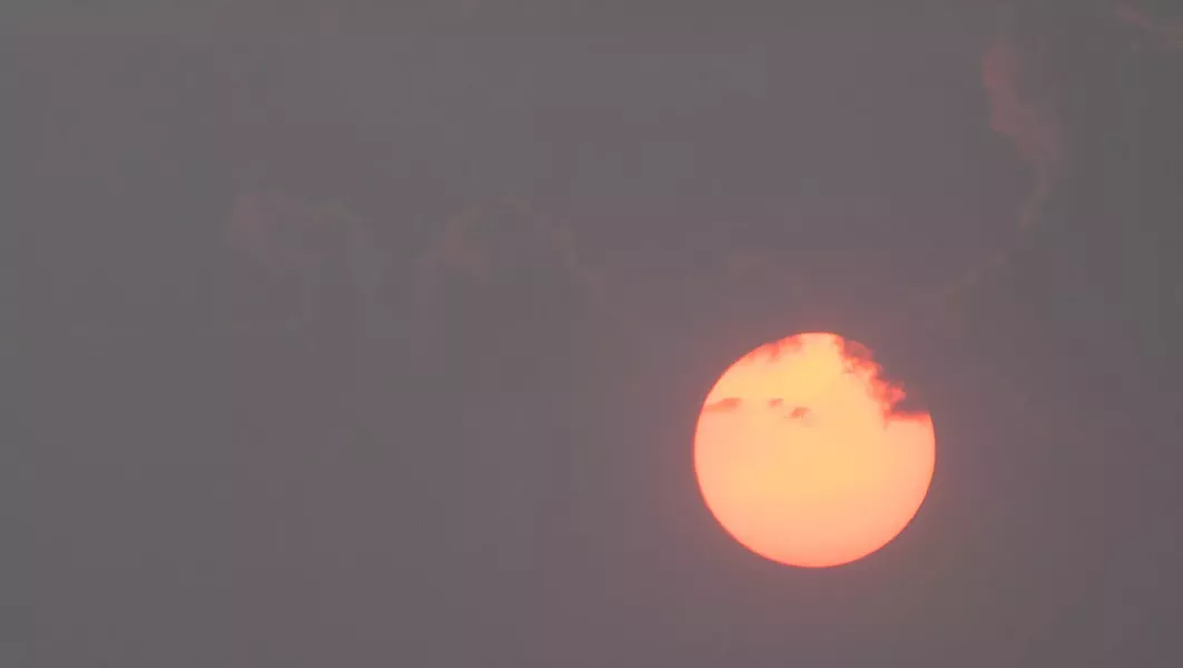 Eclipses are dumb. Terrible air quality is where all the staring-into-the-sun action is at. - DANIEL WALTERS PHOTO