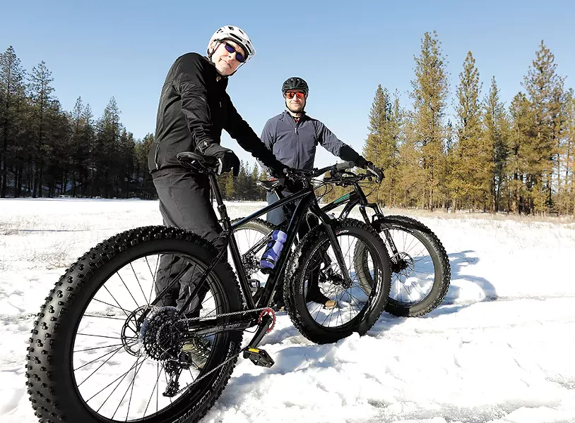 Wheelsport managers Greg Britton (left) and Trent Armstrong show off their fat-tire bikes. - YOUNG KWAK