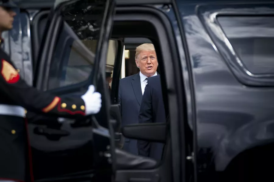 Seen through and SUV door, President Donald Trump greets Polish President Andrzej Duda upon his arrival to the White House, in Washington, Sept. 18, 2018. President Trump falsely charged on Tuesday that Democrats had sought to time a sexual assault allegation against his Supreme Court nominee, Judge Brett Kavanaugh, to obstruct his confirmation, siding with the judge as he called for a swift process for airing the accusation on Capitol Hill. - DOUG MILLS/THE NEW YORK TIMES