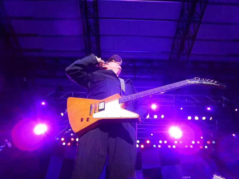 Rick Nielsen hears it from the crowd. - DAN NAILEN