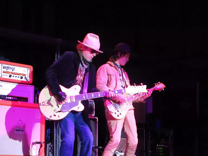 Bass player Tom Petersson and Robin Zander Jr., who is playing rhythm guitar on the band's 2018 tour dates. - DAN NAILEN