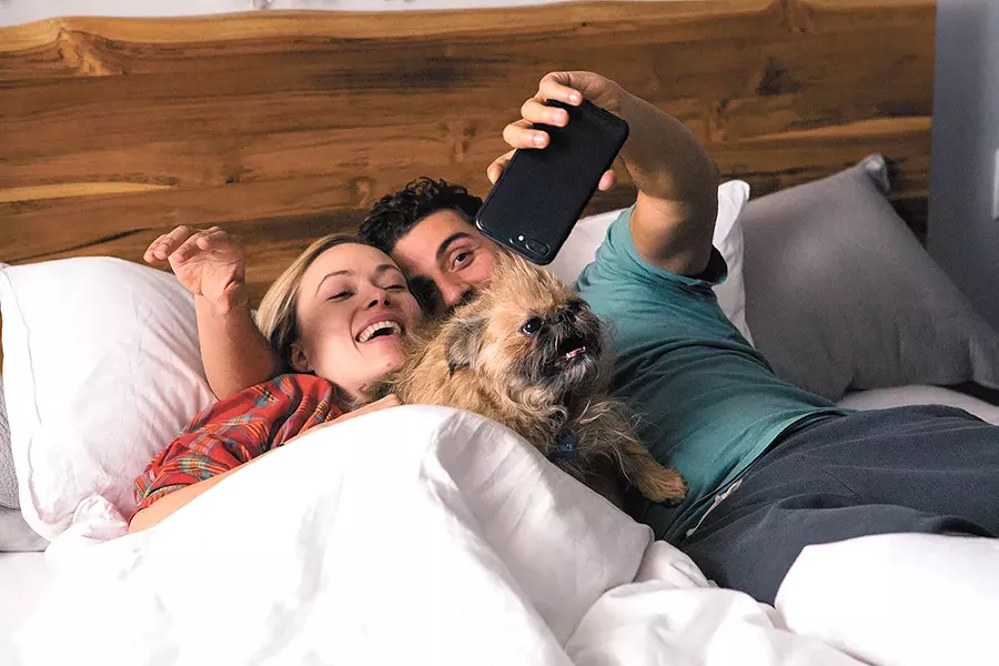 Olivia Wilde and Oscar Isaac are self(ie)-obsessed bores in Life Itself. Also pictured: Their dog F---face.