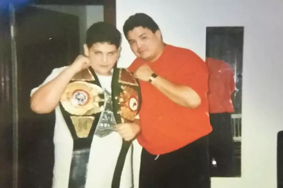 With his trainer, Joe Hipp.
