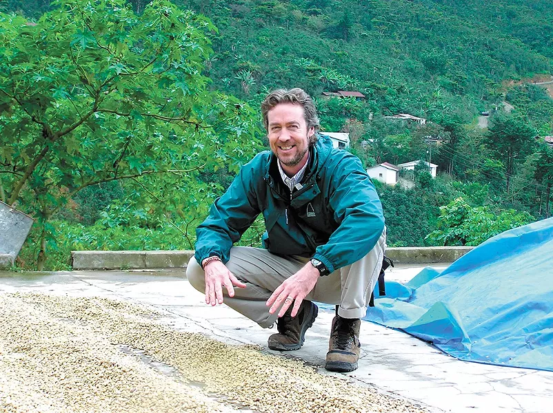 Owner Simon Thompson frequently visits the growers he buys beans from.