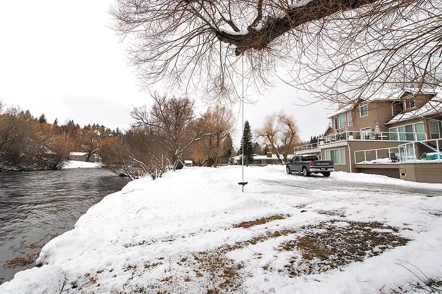 The Little Spokane River runs right by the six-unit adult home where Catherine Childs and Eloise Maddox live. - ERICK DOXEY PHOTO