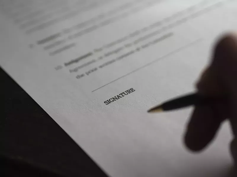 paperwork-signature-contract-deal-hand-business-962388.jpg