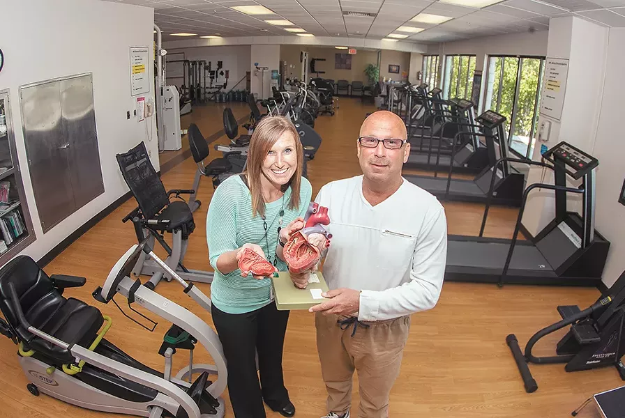 Jeff Zeiger with his physical therapist, Shaina Hicks, at St. Luke's. - MEGHAN KIRK