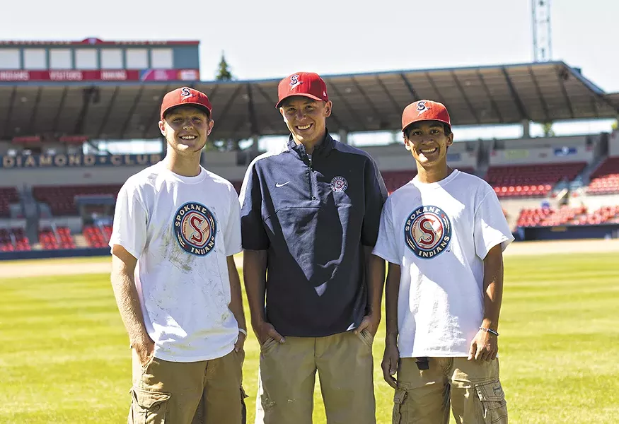 Yearout (center) with assistant groundskeepers Jacob Fender (left) and Daniel Ramirez. - YOUNG KWAK