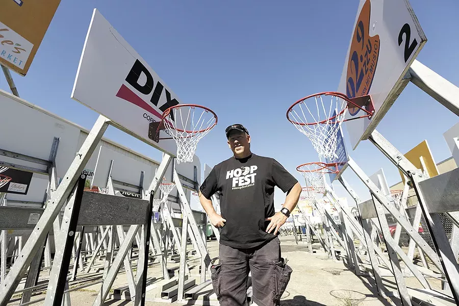 Hoopfest site manager Rob Davis spends months prior to the event prepping the hoops. - YOUNG KWAK