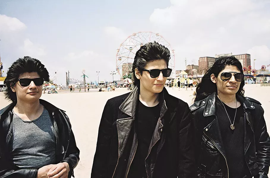 Three of the seven brothers documented in The Wolfpack.