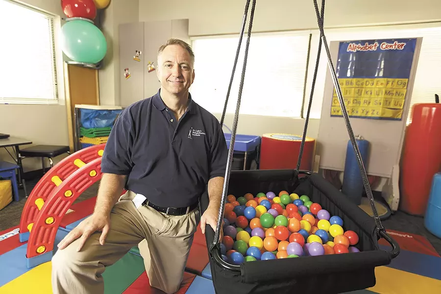 Occupational therapist Don Kammerer uses coloful toys to help fidgety kids learn strategies to focus in the classroom. - YOUNG KWAK