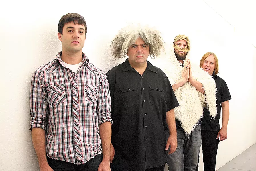 Buzz Osborne is the one with all the hair.