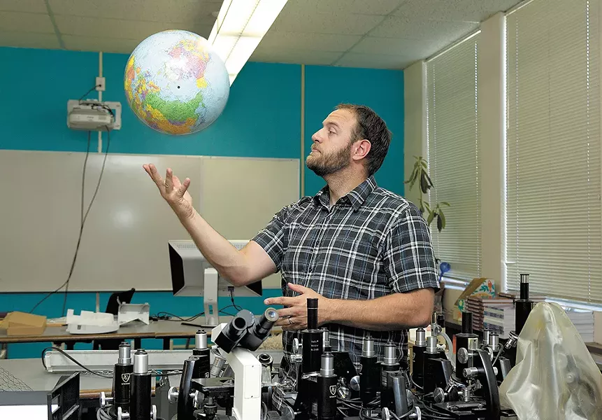 School founder Travis Franklin prepares for the first year at Spokane International Academy. - TIMOTHY PHILLIPS