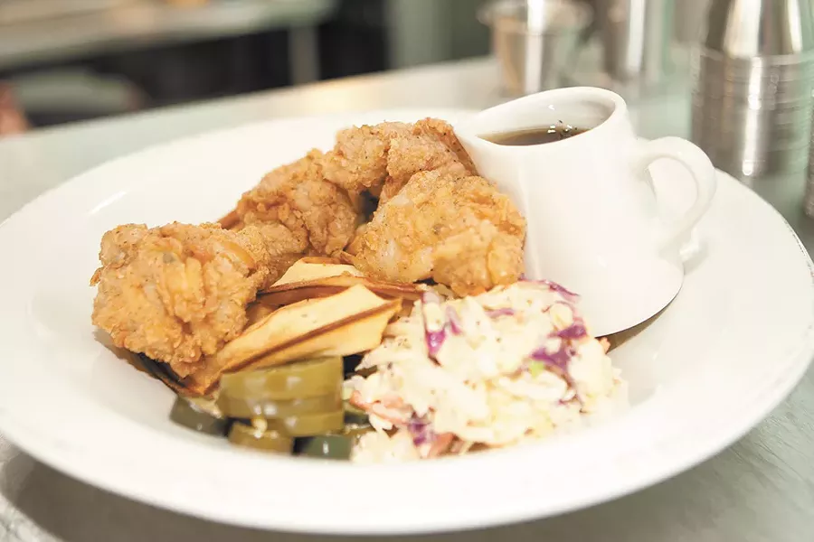 The Yards' most popular dish: chicken and waffles. - MEGHAN KIRK