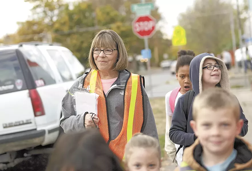 Volunteer Karen Chipley walks West Central kids to school once a week. - YOUNG KWAK