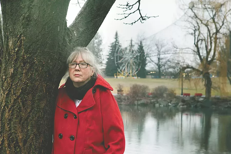 Rhoda Behrens reminisces about her son at Riverfront Park, a place he had enjoyed as a child. - KRISTEN BLACK