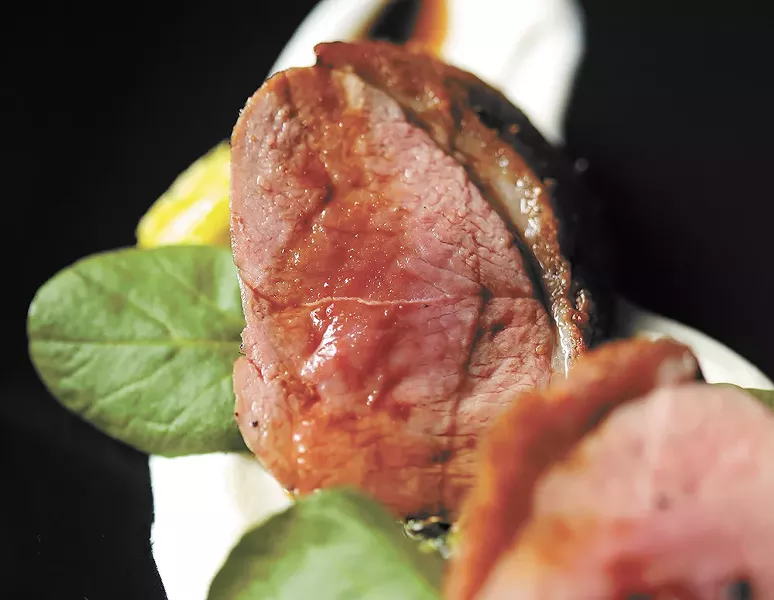 Duck breast is one of the second course options.