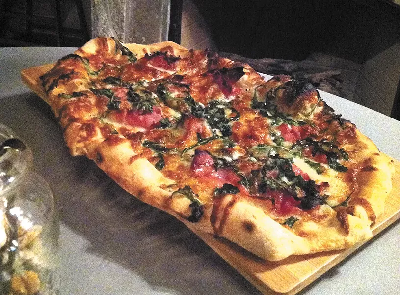 Flame & Cork offers an array of wood-fired pizzas. - CARRIE SCOZZARO